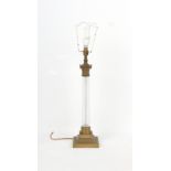Property of a gentleman - a large brass & tapering rope-twist clear glass Corinthian column table