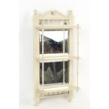 Property of a gentleman - an off-white painted Edwardian three-tier wallshelf with bevelled mirror
