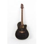 Property of a gentleman - a Tanglewood Odyssey model TMO-7NC electro accoustic guitar.