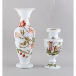 Property of a lady - two 19th century milk glass vases, the taller painted with wild flowers, the