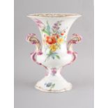 Property of a gentleman - a 19th century porcelain two handled vase painted with bouquets &