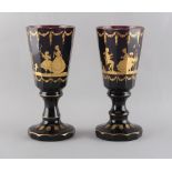 Property of a gentleman - a pair of 19th century Bohemian gilt decorated amethyst glass goblets,