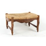 Property of a lady - a Continental carved fruitwood & rush seated duchesse brisee stool.