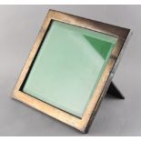 Property of a deceased estate - an 800 grade silver rectangular easel photograph frame, with