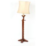 Property of a deceased estate - an oak ratchet adjustable standard lamp with shade, section of