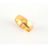 Property of a deceased estate - a 22ct yellow gold wedding band, approximately 3.9 grams, size O/P.