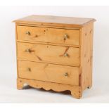 Property of a deceased estate - a late 19th / early 20th century pine chest of three long drawers,