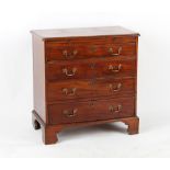 Property of a deceased estate - a small George III mahogany chest of four long graduated drawers