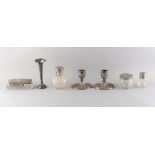 Property of a deceased estate, a lady of title - a pair of Edwardian silver dwarf candlesticks,
