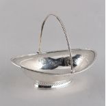Property of a deceased estate - a George III silver oval basket with swing handle, William Abdy,