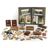 Property of a lady - a box containing assorted items including a silver cheroot holder case
