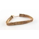 Property of a deceased estate - an unmarked yellow gold (tests 14/15ct) chain link bracelet,