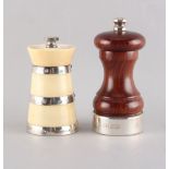 Property of a gentleman - a silver mounted ivory pepper mill, Birmingham 1939, 3.25ins. (8.3cms.)