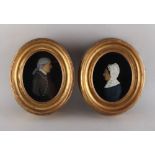 Property of a gentleman - a pair of late 18th / early 19th century wax profiles of a lady and