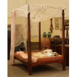 Property of a lady - a mahogany four poster bed, parts 19th century, 54ins. (137cms.) wide.