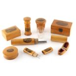 Property of a gentleman - a collection of eight late 19th century Mauchline ware items including