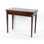 Property of a lady - a George III Cuban mahogany rectangular fold-over tea table, with square
