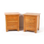 Property of a deceased estate - a pair of modern solid wood bedside tables or chests of drawers,