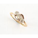 Property of a deceased estate - an 18ct yellow gold diamond three stone ring, the estimated total
