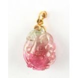 A Chinese pink tourmaline pendant carved in the form of a chilong, with 18ct yellow gold mount,
