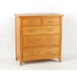 Property of a deceased estate - a modern solid wood chest of drawers, 35.5ins. (90cms.) wide (