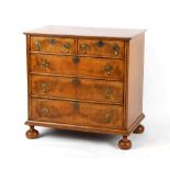 Property of a deceased estate - a Queen Anne style burr walnut & feather-banded chest of two short &