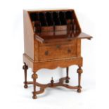 Property of a deceased estate - a Queen Anne style burr elm fall-front bureau of small size, 25.