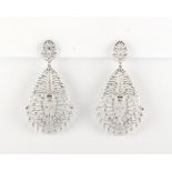 A large pair of 18ct gold diamond openwork earrings, of stylised veined leaf design set with diamond