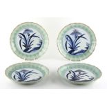 Property of a lady - a set of four Japanese Arita blue and white & celadon shallow dishes, 18th /