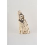 Property of a gentleman - a Chinese carved walrus ivory figure of a sage, early 20th century,