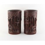 Property of a gentleman - a pair of Chinese carved bamboo brush pots, bitong, each 8ins. (20.