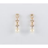 A pair of 18ct yellow gold pearl & diamond earrings, the untested pearls each approximately 8mm