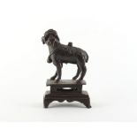 Property of a gentleman - a Chinese bronze joss stick holder modelled as a lion, Ming dynasty (