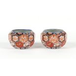 Property of a gentleman - a pair of 19th century Japanese Imari planters of honeycomb form, each