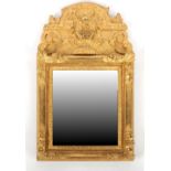 Property of a lady of title - a 19th century Continental giltwood framed wall mirror with later