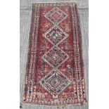 Property of a gentleman - an antique Caucasian Kazak rug, 98 by 48ins. (249 by 122cms.).