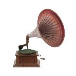 Property of a deceased estate - an early 20th century oak cased wind-up gramophone with tin horn.