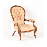 Property of a deceased estate - a Victorian carved walnut & button upholstered armchair with