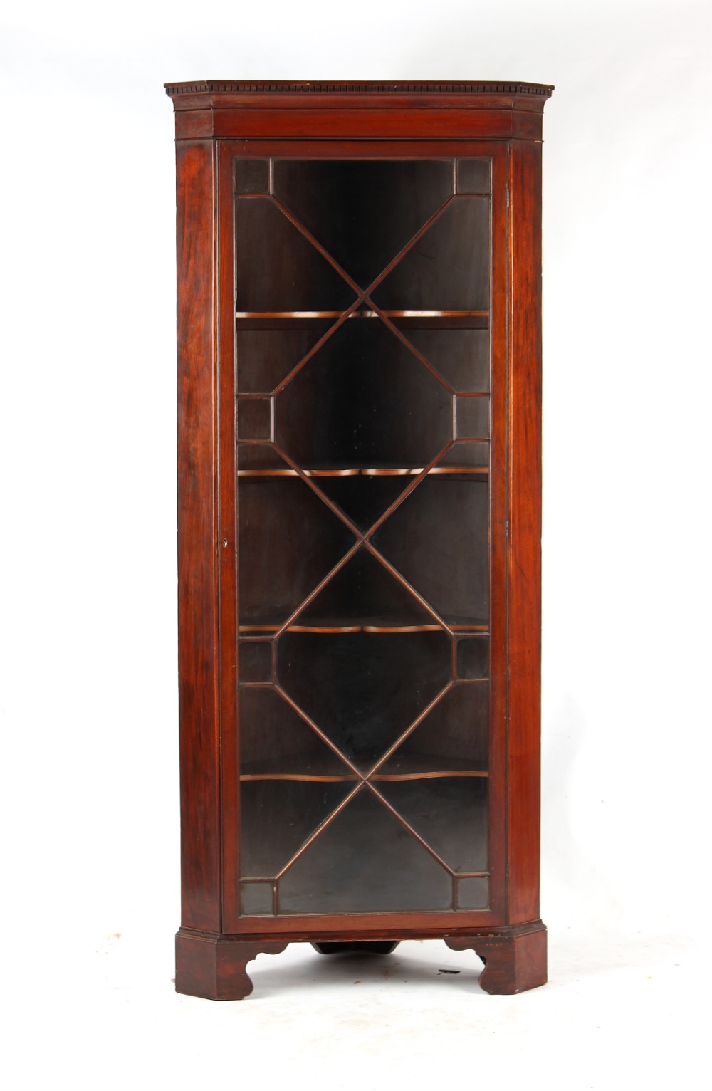 Property of a gentleman - a 19th century mahogany freestanding corner display cabinet with dentil