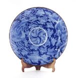 Property of a lady - a large Japanese blue & white charger, circa 1900, 18ins. (45.5cms.) diameter.