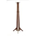 Property of a deceased estate - a late Victorian walnut hat & coat stand, with weighted base.