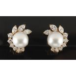 A pair of 18ct yellow gold pearl & diamond earrings, each set with a large pearl measuring