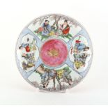 Property of a gentleman - a Chinese famille rose shallow dish painted with four panels of figures,