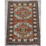 Property of a gentleman - a Turkish hand knotted rug of Kazak design, 58 by 43ins. (148 by 99cms.).