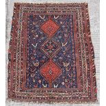 Property of a lady - a Persian Afshar rug, first half 20th century, 62 by 51ins. (157 by 130cms.).