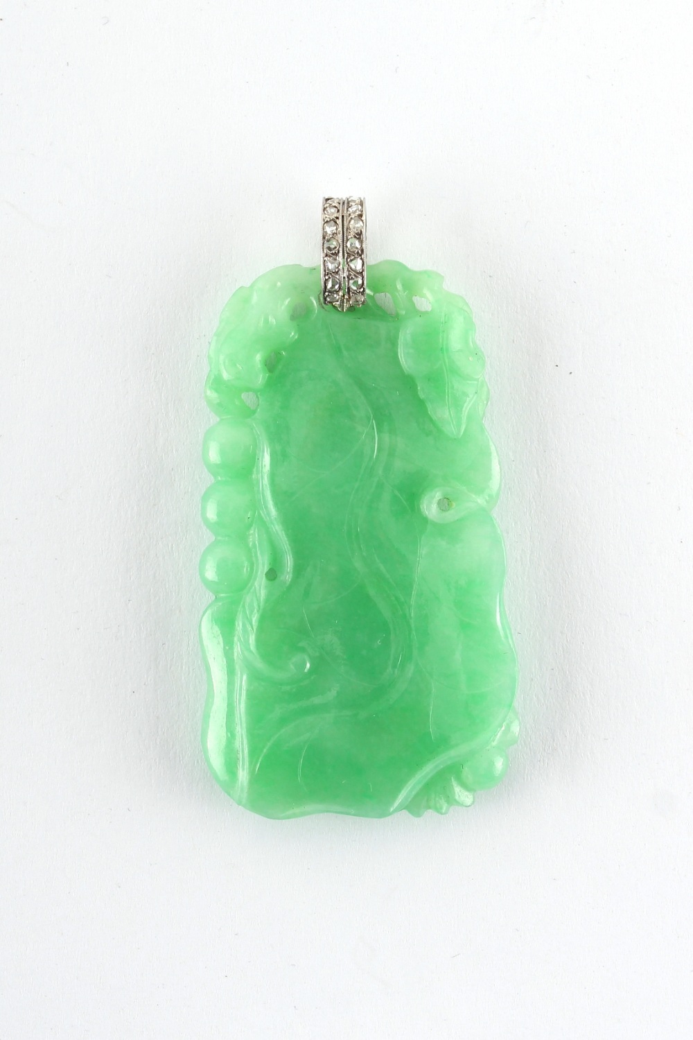 A very good Chinese carved natural jadeite pendant with diamond set suspension loop, the evenly - Image 2 of 2