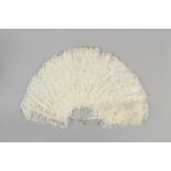 Property of a gentleman - a late 19th / early 20th century mother-of-pearl & white ostrich feather