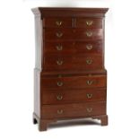 Property of a lady - a George III mahogany tallboy or chest-on-chest, with brushing slide, the