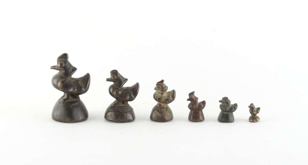 Property of a gentleman - a graduated set of six bronze opium weights modelled as birds, the tallest