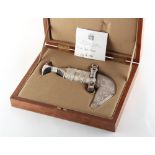 Property of a deceased estate - a United Arab Emirates presentation white metal dagger, in fitted